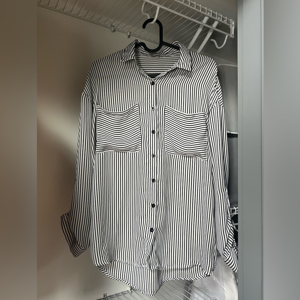 Button up shirt / blouse.